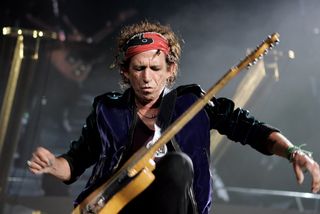 Keith Richards performs with the Rolling Stones at London's Twickenham Stadium in 2006