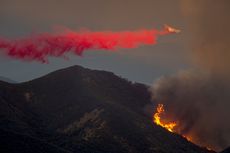A plane drops fire retardant on the Sherpa fire in Santa Barbara County, California.