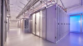 A photo of a data center lit in purple and blue lighting, It is atNorth's ICE02 data center in Iceland, the location for Shearwater's servers.
