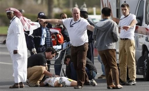 Medics clear the area so that Chloe Hosking can be transported to the hospital.
