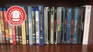 Blu-rays on shelf.
