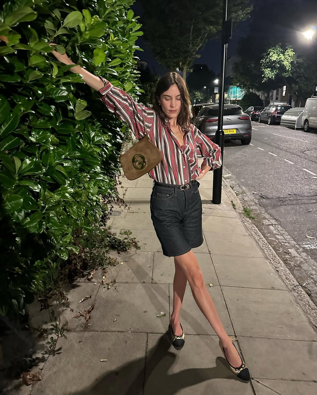 Alexa Chung wearing ballet flats with shorts