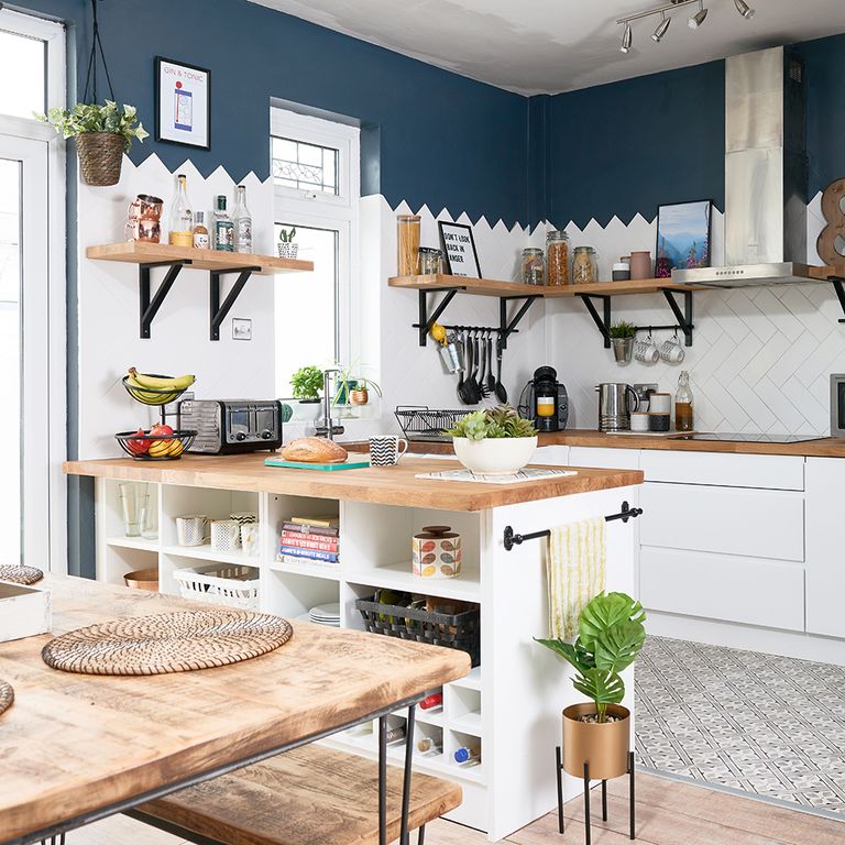 Kitchen makeover with white units, herringbone metro tiles and blue