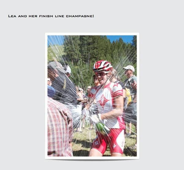 Lea Davison enjoys champagne at the finish line