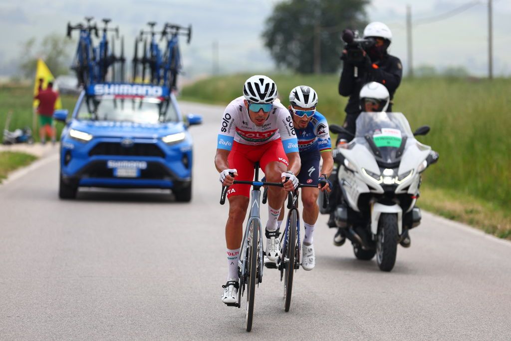 Team Soudal-Quick Step's French rider Julian Alaphilippe (R) and Team Polti-Kometa's Italian rider Mirco Maestri ride ahead during the 12th stage of the 107th Giro d'Italia cycling race, 193km between Martinsicuro and Fano, on May 16, 2024. (Photo by Luca Bettini / AFP)
