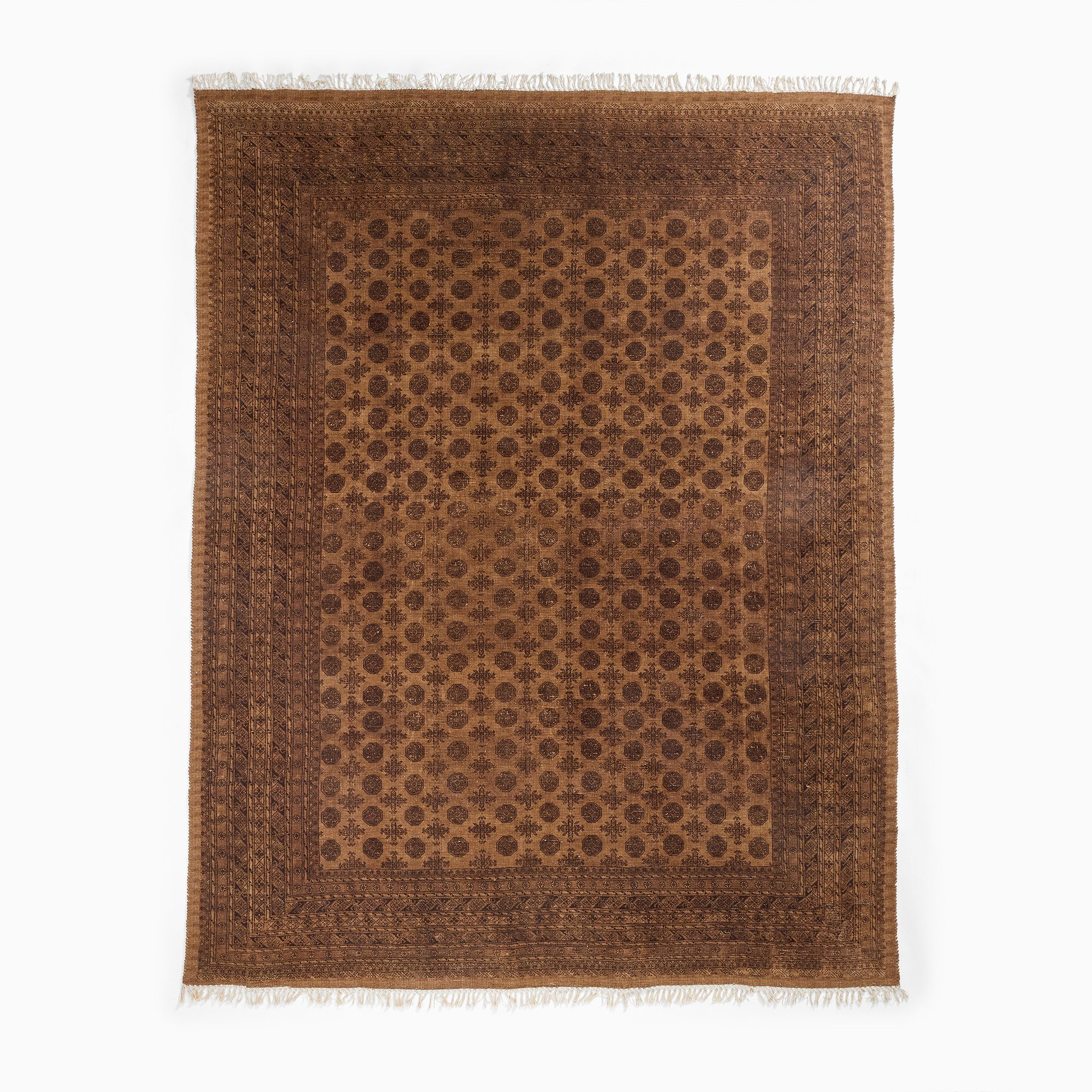 a vintage inspired rug in brown with medallion motifs