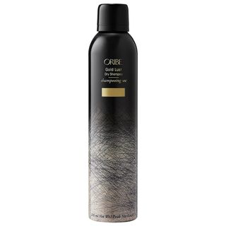 bottle of Gold Lust Dry Shampoo on a white background
