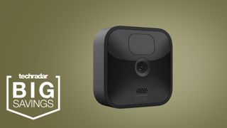 The Blink outdoor home security camera on a khaki green background
