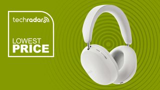 white Sonos Ace Dolby Atmos headphones on green background with TechRadar lowest price sign