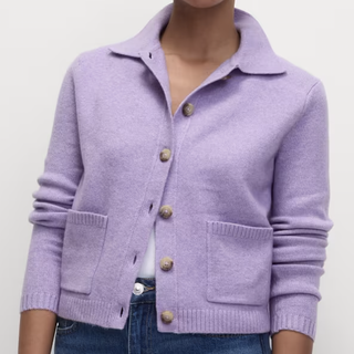 A model wears an M&S Collared Neck Relaxed Fit Knitted Jacket in frosted lilac