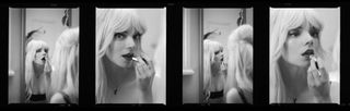 Series of black and white Anya Taylor-Joy images putting on lipstick