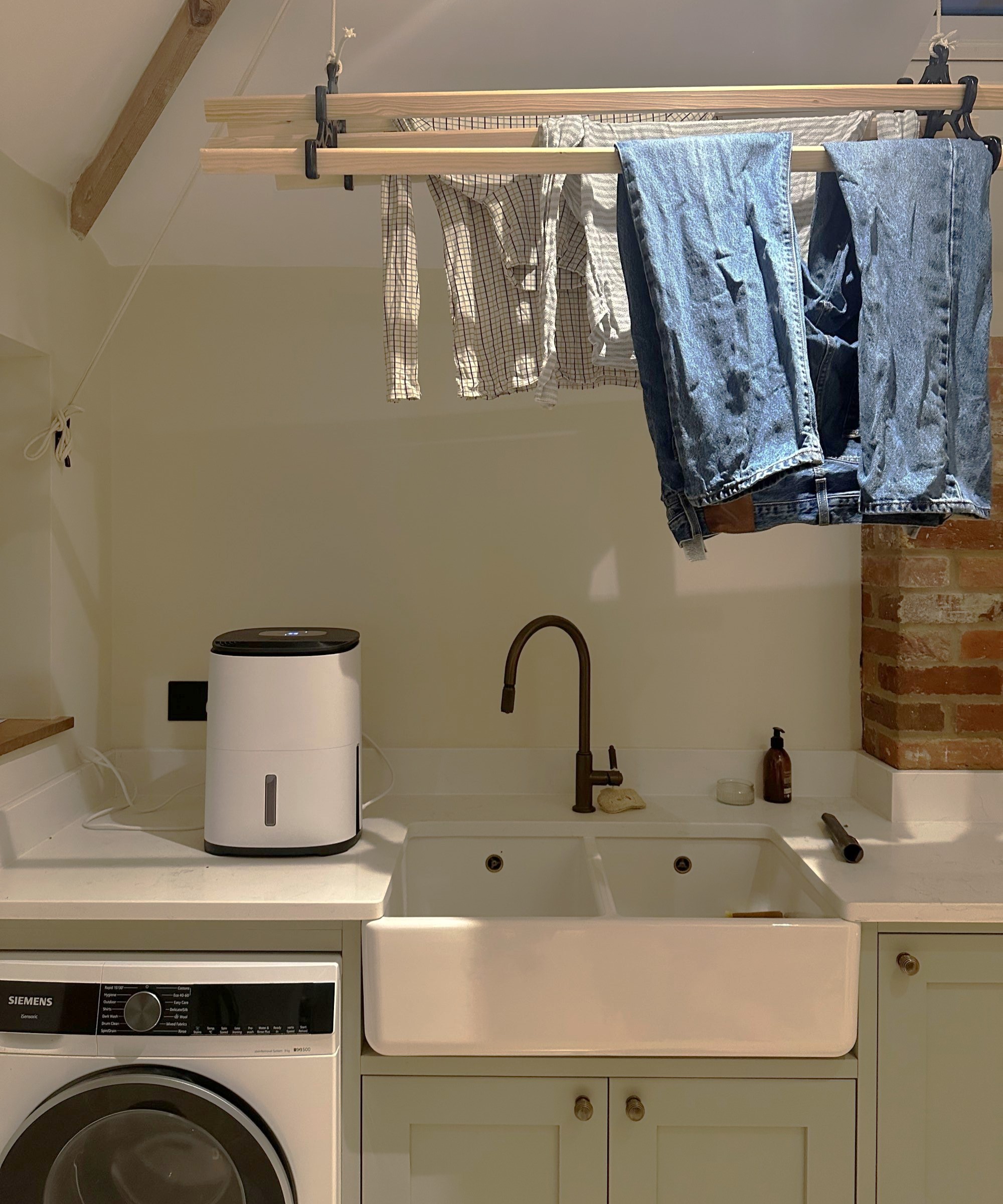 The MeacoDry Arete One 6L Compact dehumidifier on the worktop in my utility room