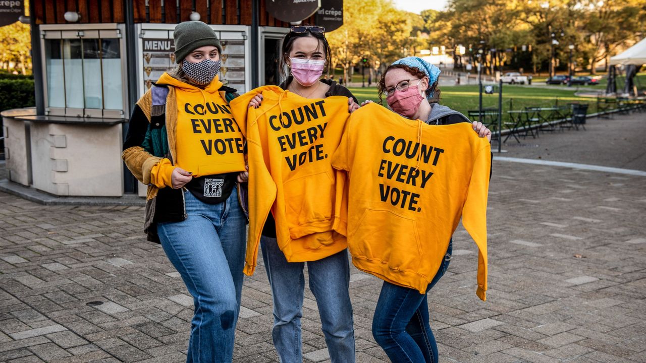 2020 voters with voting t-shirts