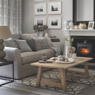 grey living room with log burner