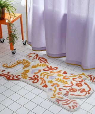 Bathroom tiger rug on tiled floor