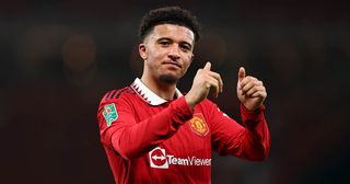 Jadon Sancho of Manchester United applauds during the Carabao Cup Semi Final 2nd Leg match between Manchester United and Nottingham Forest at Old Trafford on February 1, 2023 in Manchester, England.
