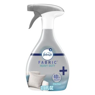 A side on view of a grey bottle Febreze heavy-duty fabric spray