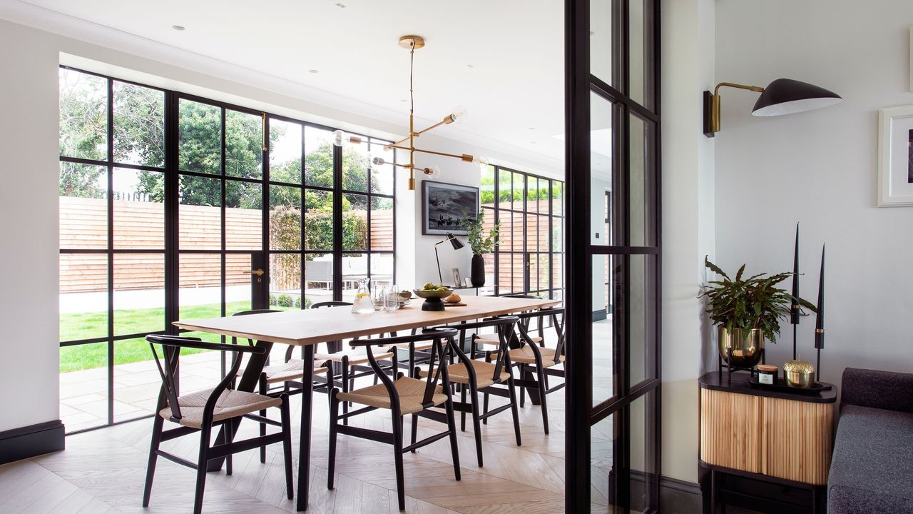 Dining area in extended property with Crittall-style doors to the patio