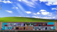 Screenshot of My Little Life showing a large house sitting on the bottom of a desktop