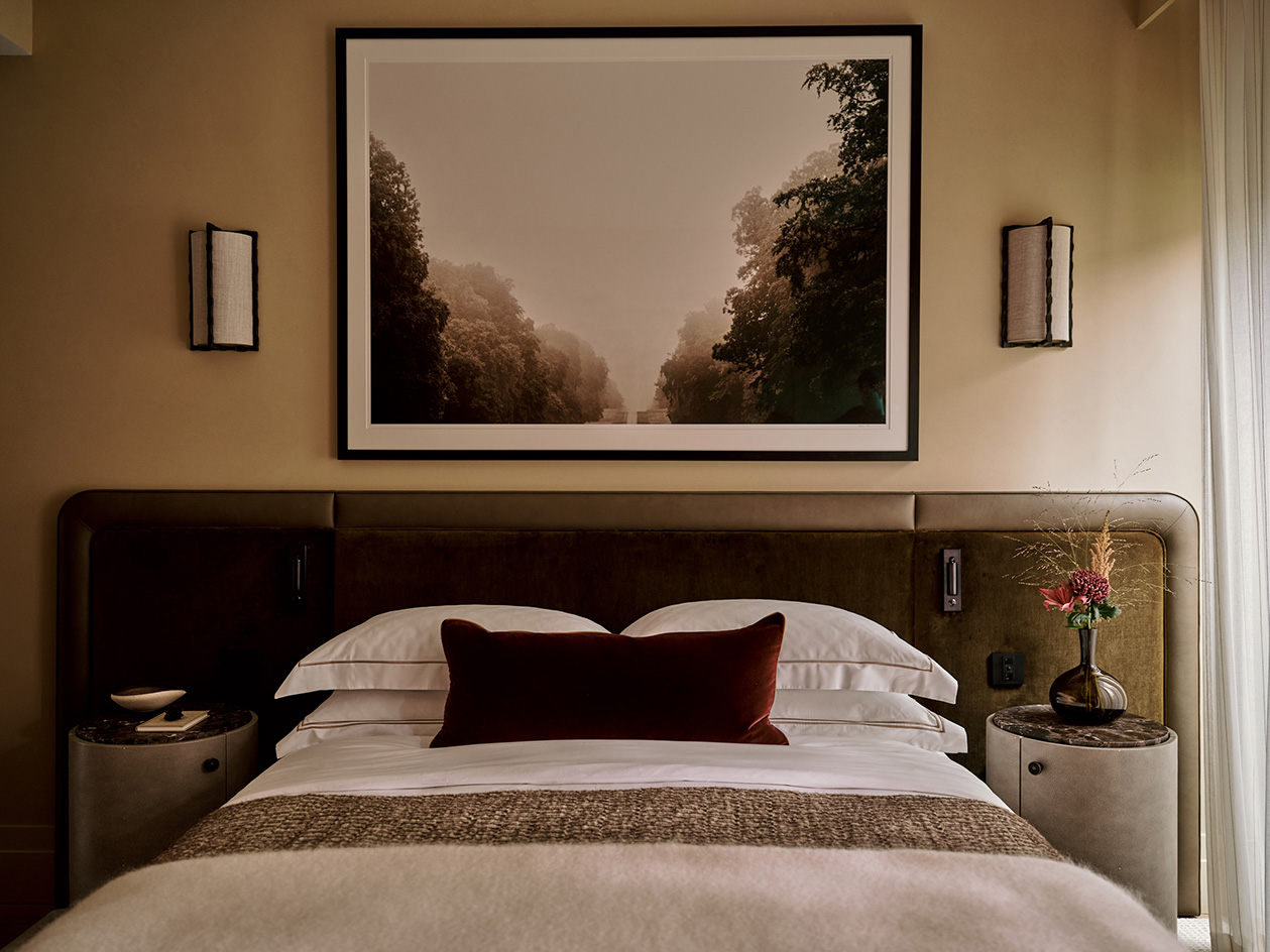 interiors of home in 100 George Street, warm, brown tones and fabrics