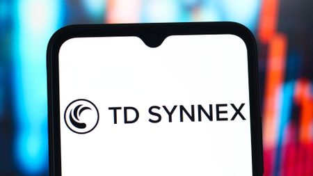 TD SYNNEX logo and branding picture on a smartphone screen with white background.