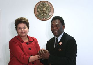 Football legend Pele greets Brazil president Dilma Rousseff in 2011.