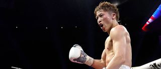 Naoya Inoue celebrates retaining his undisputed super bantamweight world title against Ramon Cardenas
