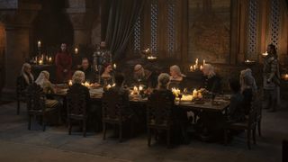 The Greens and Blacks at a banquet table in "House of the Dragon" season 1 episode 8