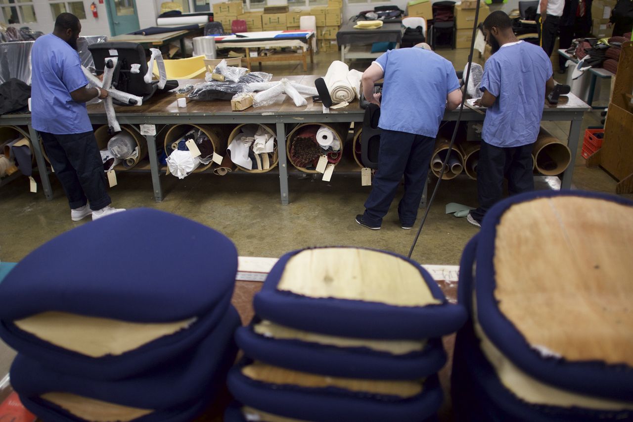 Inmates working at a furniture shop in Pennsylvania.