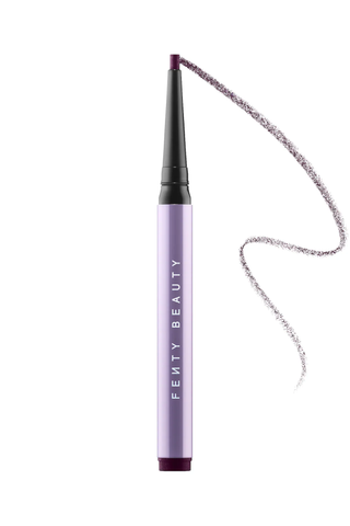 A purple Fenty Beauty eyeliner stick set against a white background.