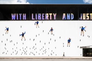 Deborah Roberts, Little man, little man, 2020 on the facade of the Contemporary Austin