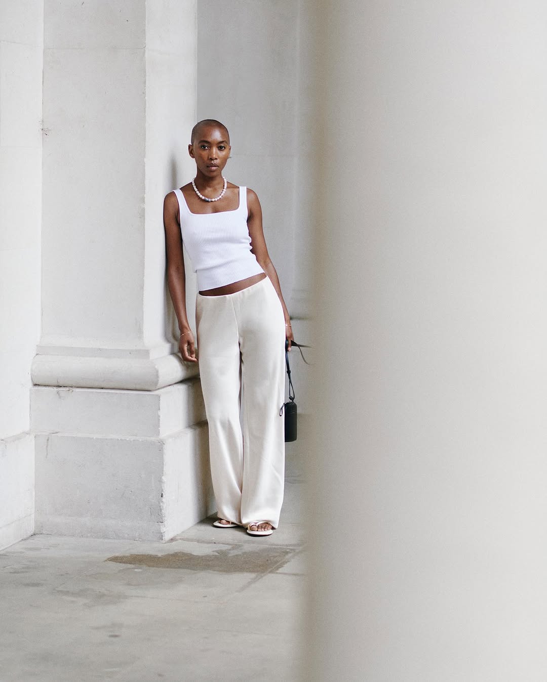 marisa wearing satin trousers