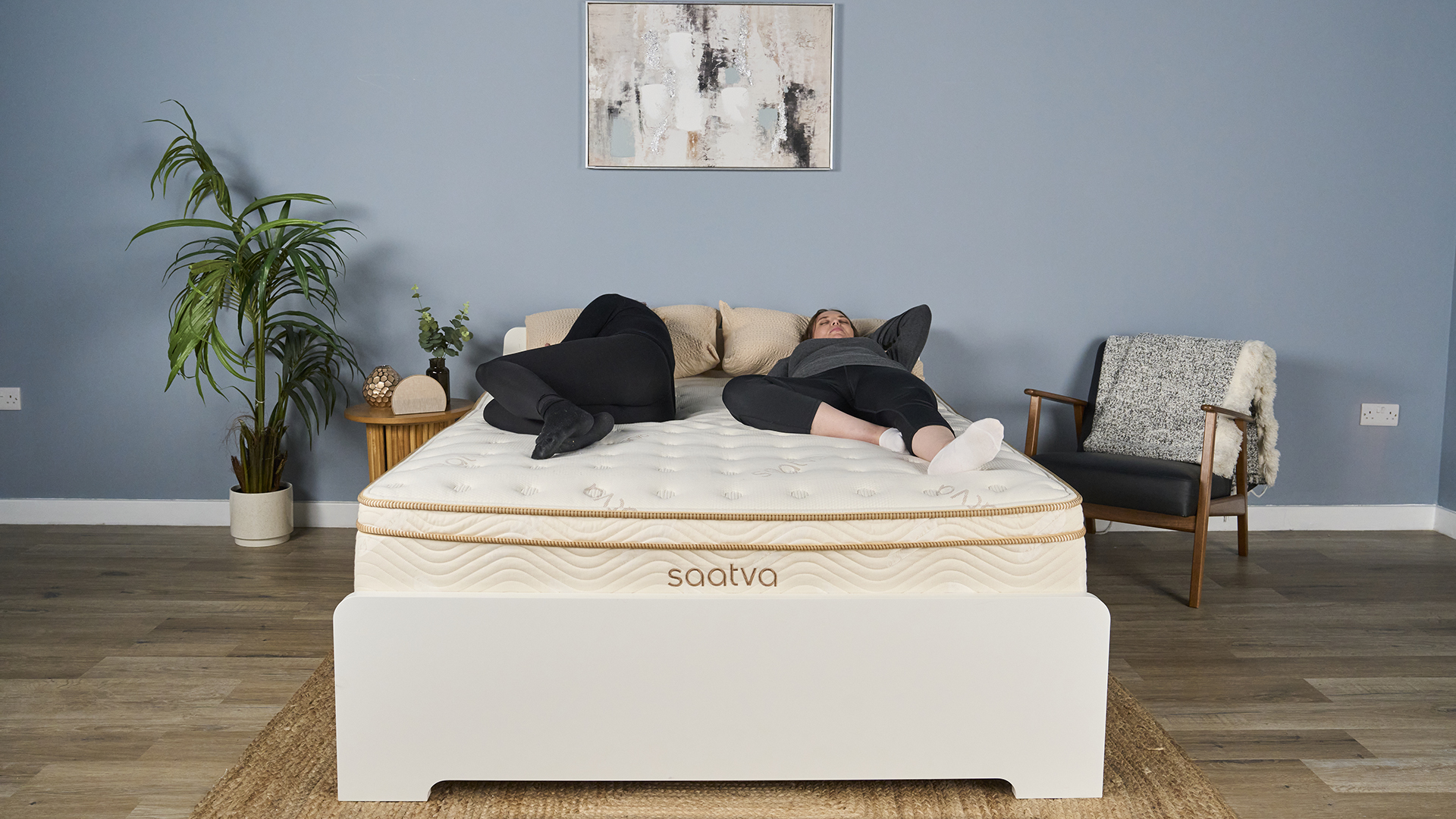 Our image shows two of the Tom&#039;s Guide mattress testing team lying on the Saatva Classic in our Sleep Product Testing Lab, during a pressure relief test. It&#039;s easy to see from the image how both testers are kept on top of the mattress instead of sinking in deeply, giving a true reflection of just how good the Saatva Classic mattress is at balancing support and comfort for a wide range of body types