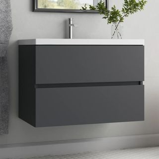 An Albion 30.5'' Wall Mounted Single Bathroom Vanity with Stone Vanity Top in a gray bathroom