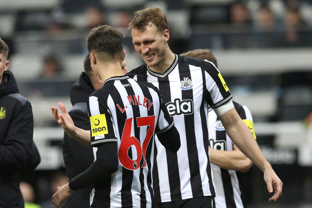 Newcastle United pair Dan Burn celebrating with Lewis Miley during the Premier League match between Newcastle United and Fulham at St. James&#039;s Park in Newcastle, on December 16, 2023.