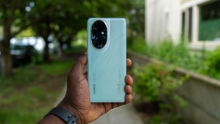 Holding the Honor 200 Pro outside