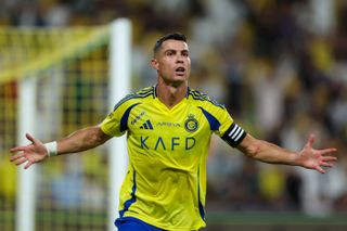 Cristiano Ronaldo celebrates after scoring for Al-Nassr against Al-Raed in August 2024.