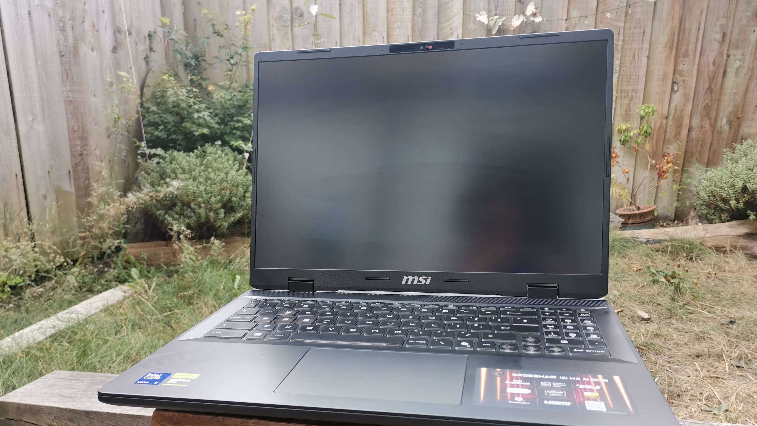 An MSI gaming laptop outdoors.