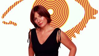 Davina McCall in front of Big Brother symbol