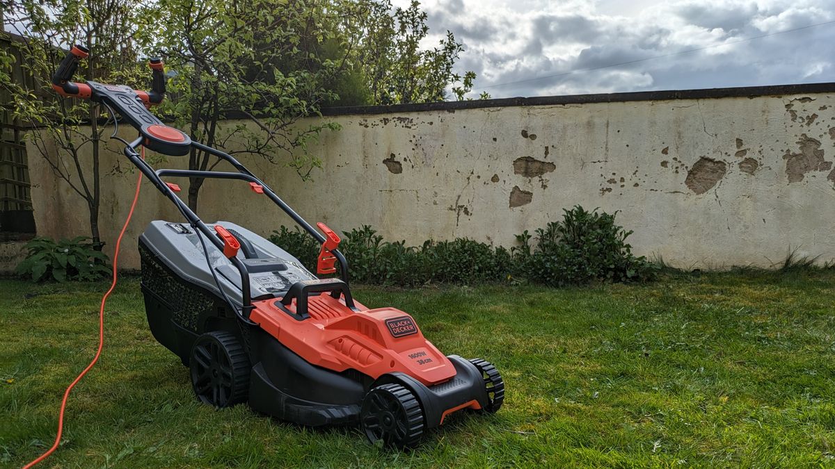 The long handle assembly on the Black + Decker mower gives the machine an elegant, elongated form.