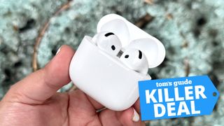 AirPods 4 seen in case with a Tom's Guide Killer Deal sticker