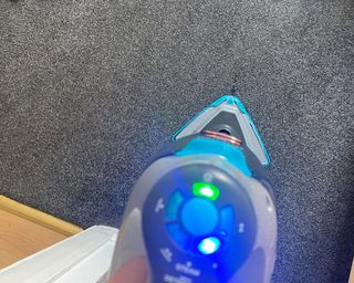 Image of Vax steam cleaner being used to refresh carpet