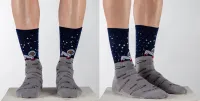 Two images of DeFeet 'Moondoggo' socks on a model's feet from different angles