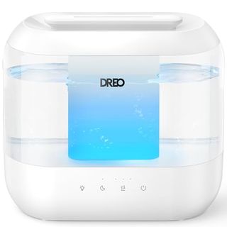 A white Dreo Humidifiers for Bedroom filled with water