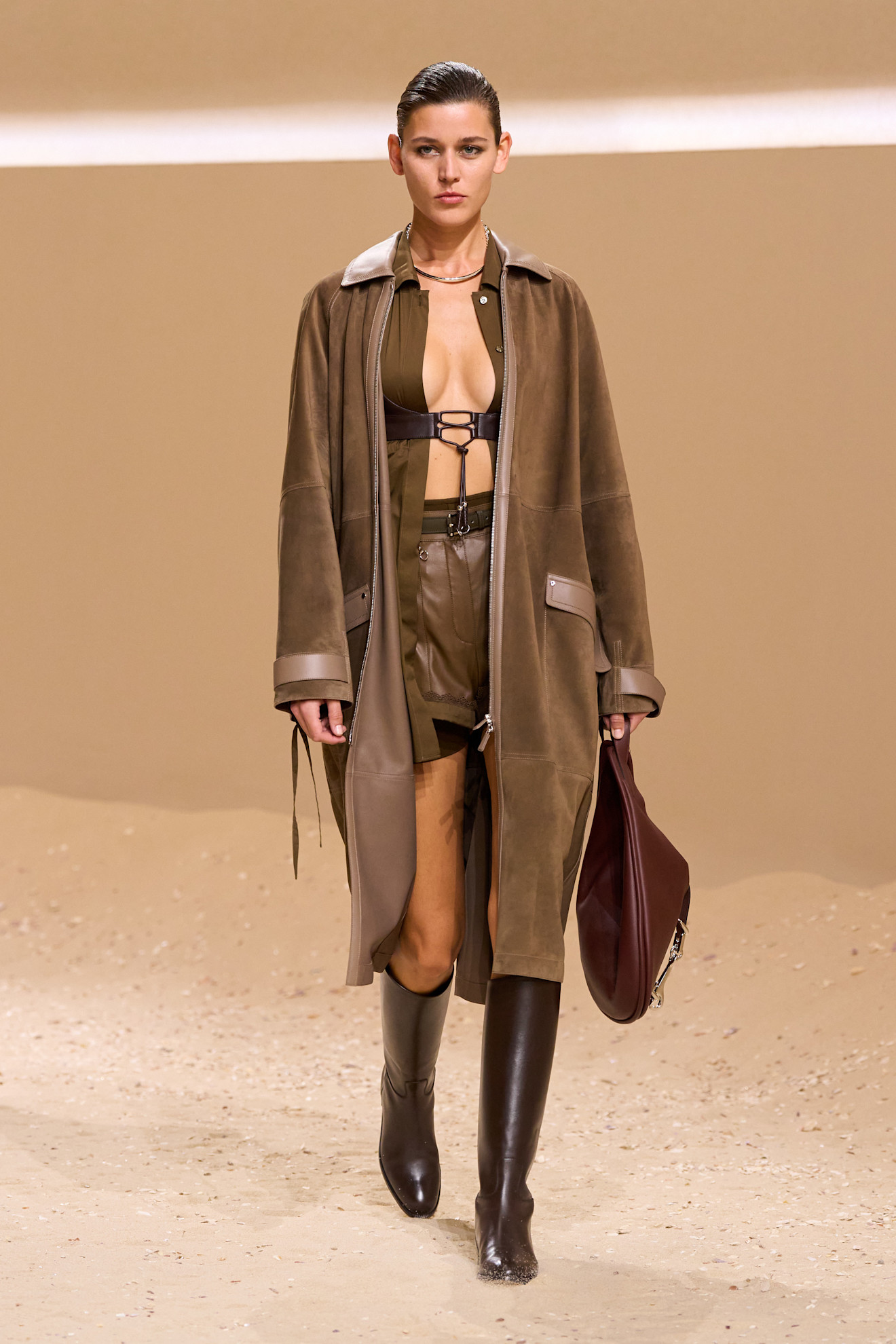 A model walks the hermes spring 2026 runway show in paris.