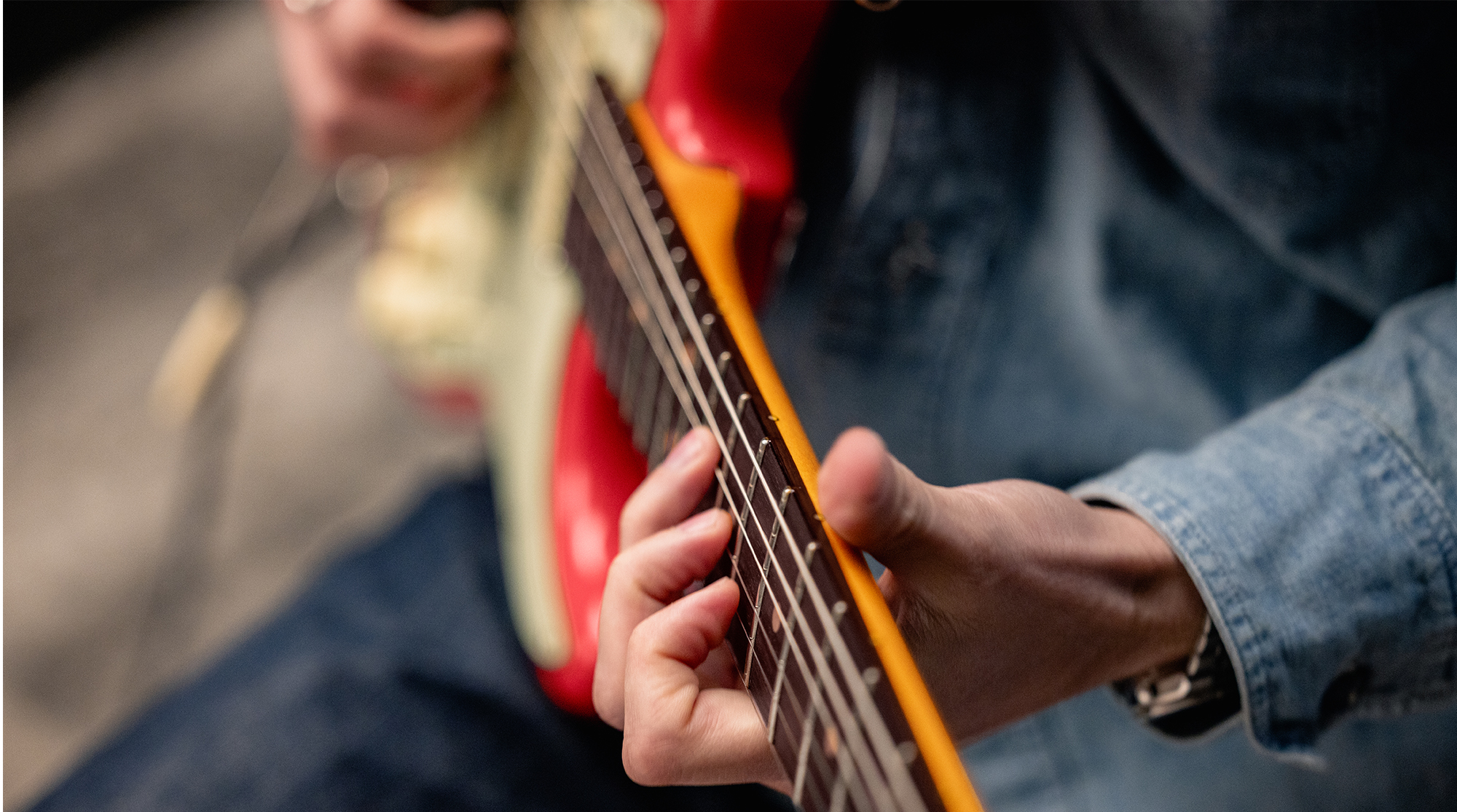 A detail photo of the Fender American Ultra Luxe Vintage &amp;rsquo;60s Stratocaster HSS in Fiesta Red