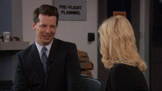 Sean Hayes talking to Amy Poehler on Parks and Recreation.
