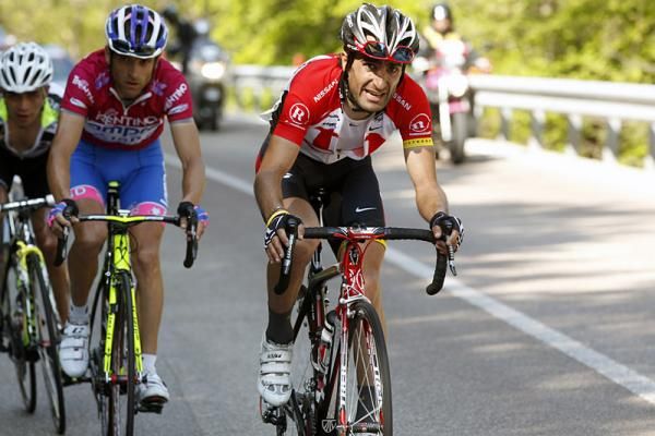 Tiago Machado leads Michele Scarponi and Fabio Duarte.