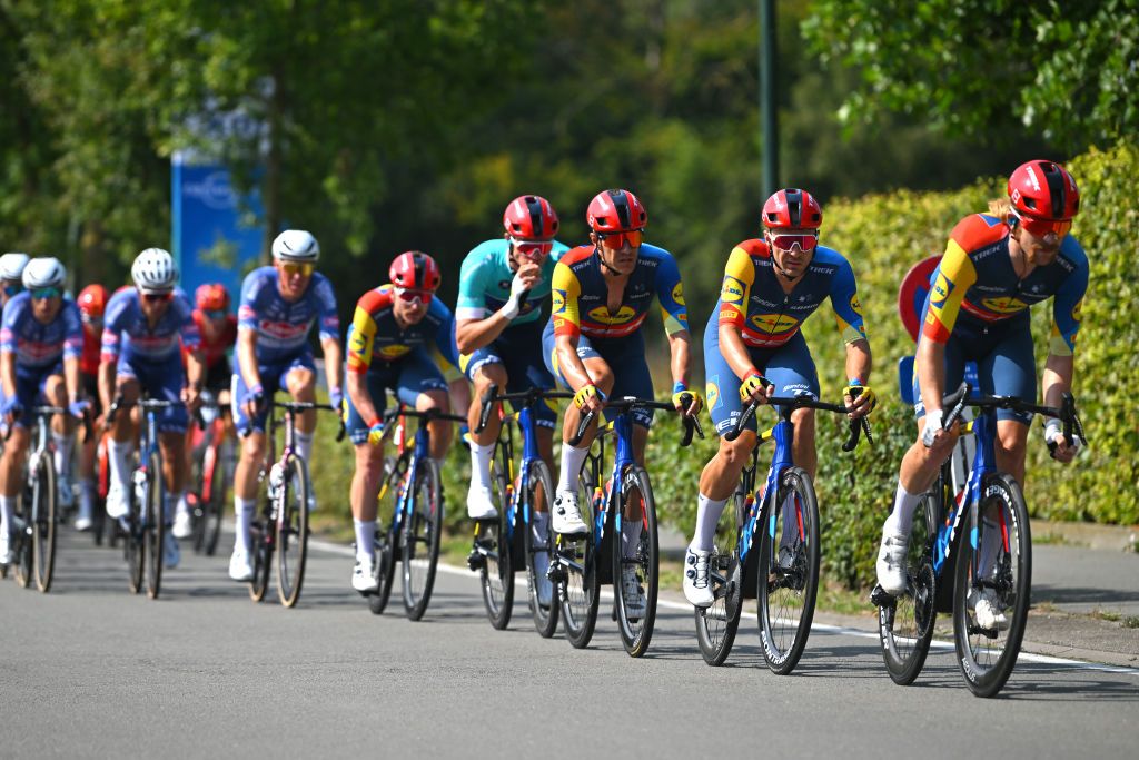 AALTER BELGIUM AUGUST 31 LR Jasper Stuyven of Belgium and Edward Theuns of Belgium and Team Lidl Trek compete during the 20th Renewi Tour 2024 Stage 4 a 1785km stage from Oostburg to Aalter UCIWT on August 31 2024 in Aalter Belgium Photo by Luc ClaessenGetty Images