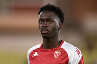 Soungoutou Magassa of AS Monaco looks on during the warm up prior to the Ligue 1 Uber Eats match between AS Monaco and RC Lens at Stade Louis II on September 02, 2023 in Monaco, Monaco.
